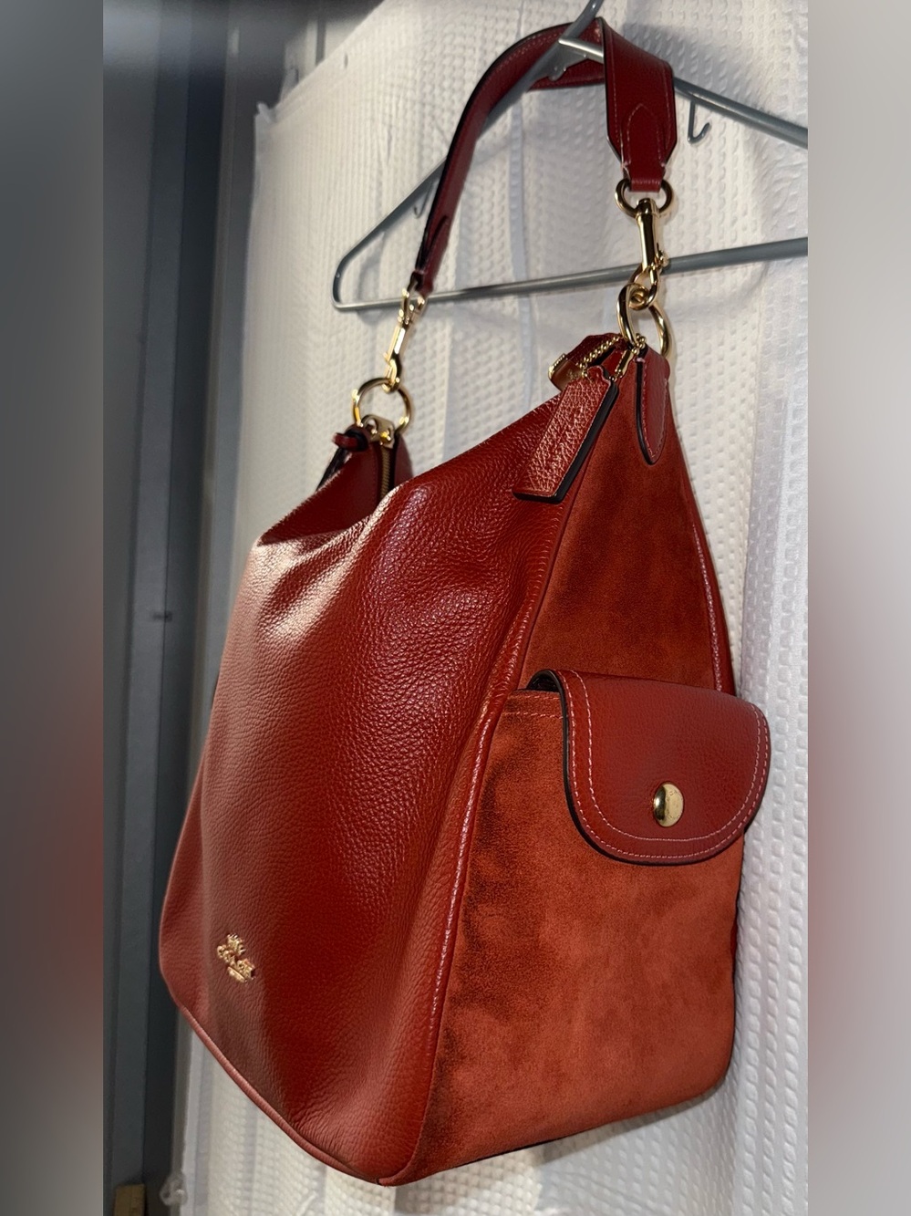 Coach Pennie Shoulder Bag features gold hardware and side suede pockets - Picture 3 of 15
